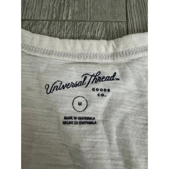 Universal Studios Beige V Neck Tee Shirt